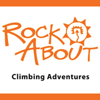 This is the link and logo to Rock About, a rock climbing program.